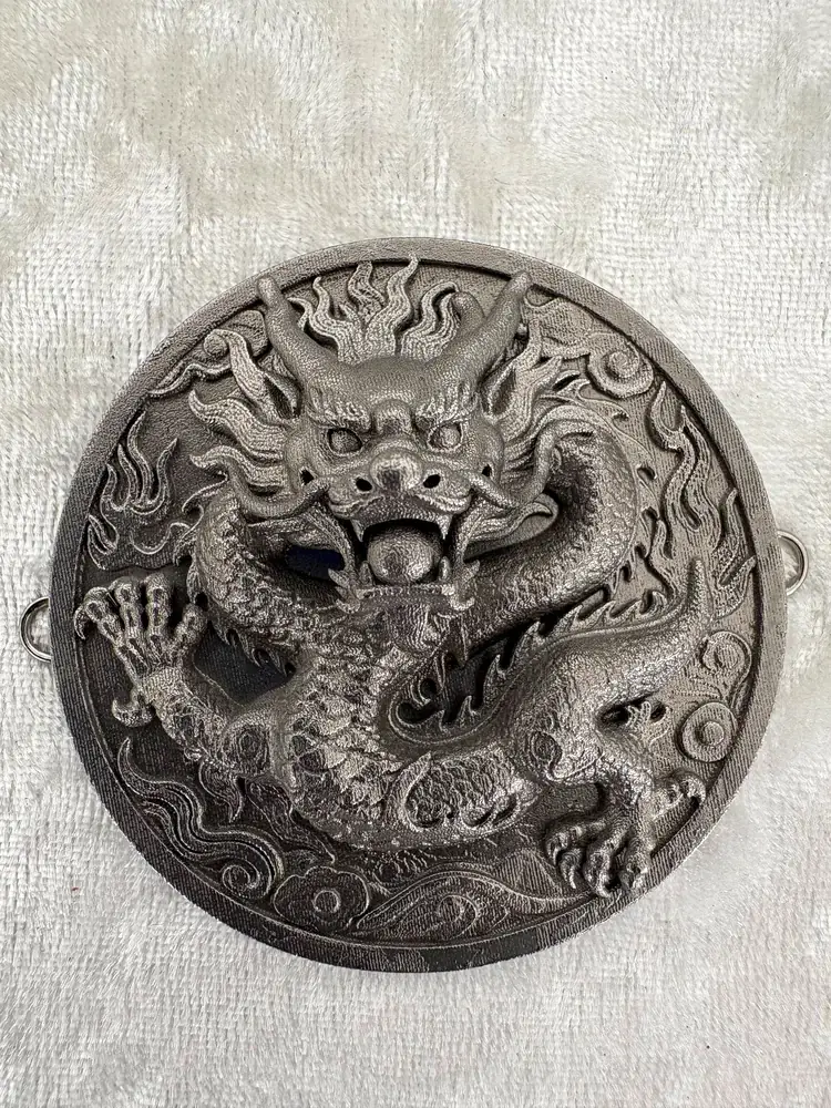 Stainless steel dragon medallion with antique finish