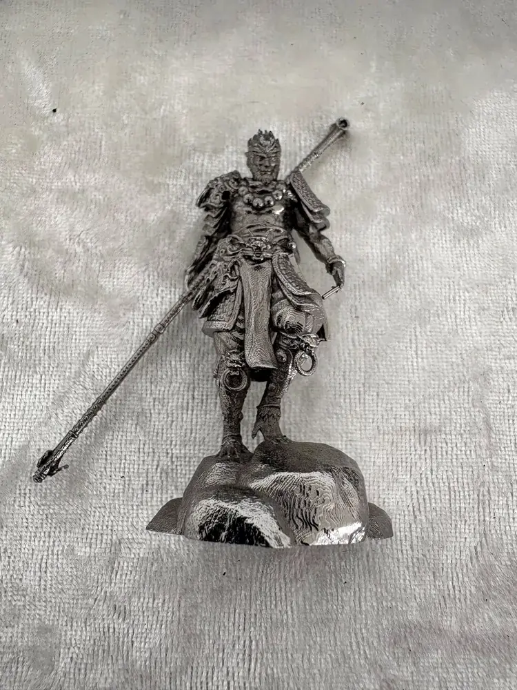 Stainless steel figurine