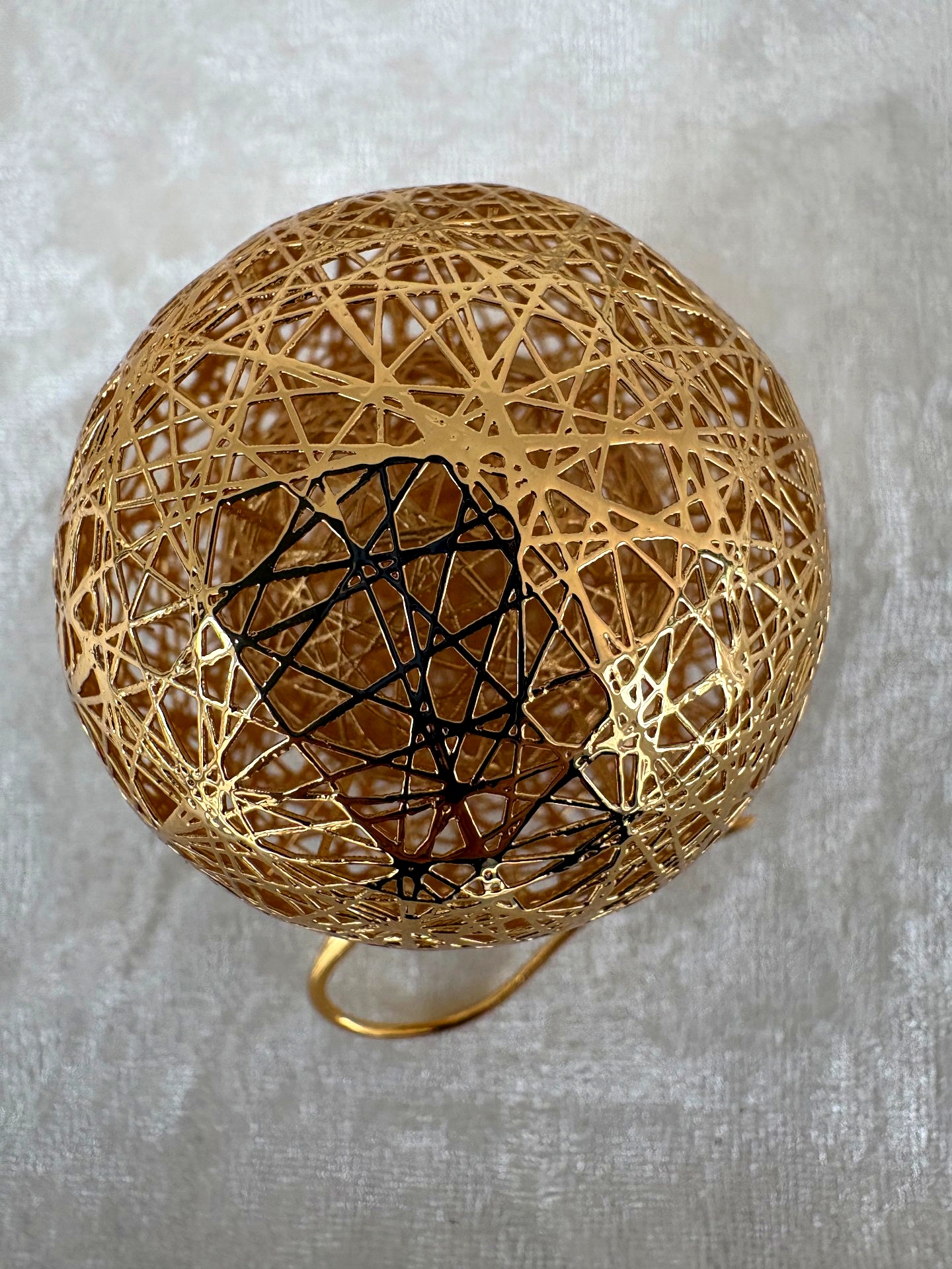 Gold lattice sphere pendant